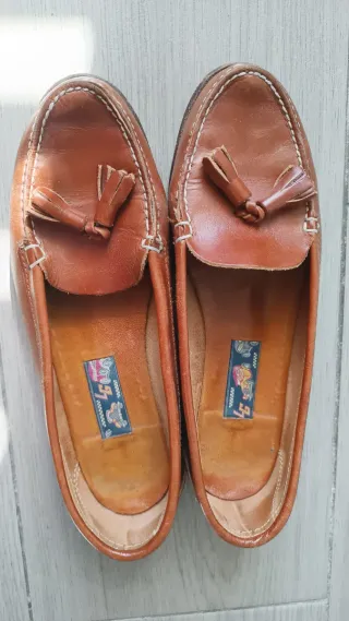 Mocasines de piel marrones con flecos