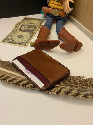 Cartera de cuero marrón y negra