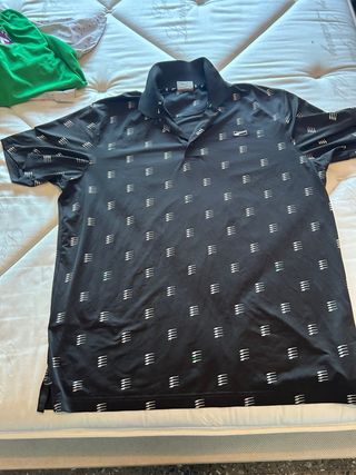 Polo de golf negro de Puma 