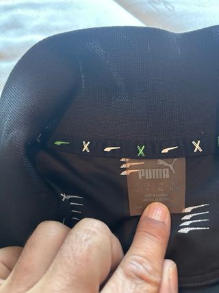 Polo de golf negro de Puma 