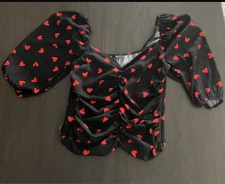 Blusa escote corazón con cremallera