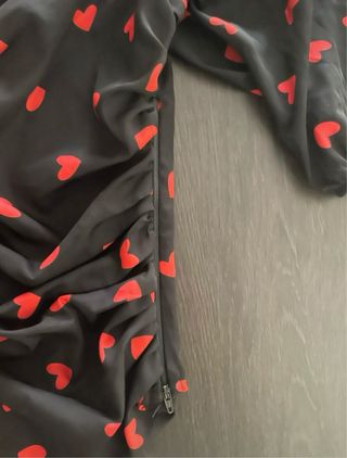 Blusa escote corazón con cremallera