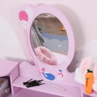 Tocador infantil rosa con espejo y taburete