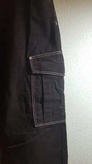 Pantalón vaquero chica con multiples bolsillos