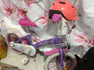Bicicleta infantil morada con cesta