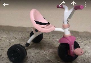 Triciclo infantil rosa y blanco