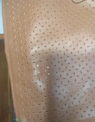 Botas altas marrones perforadas