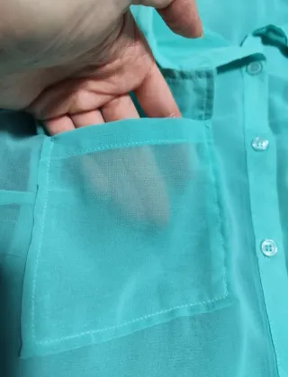 Blusa sin mangas turquesa 