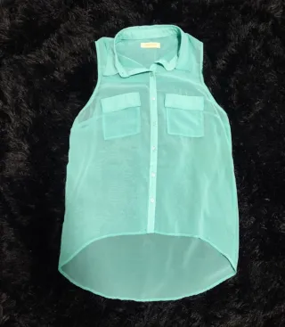 Blusa sin mangas turquesa 