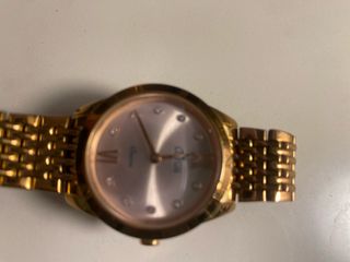 Reloj Lotus Mujer Dorado rosado.
