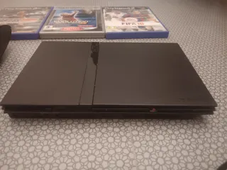 Consola PS3 + PS2, 4 mandos y 6 juegos