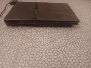 Consola PS3 + PS2, 4 mandos y 6 juegos