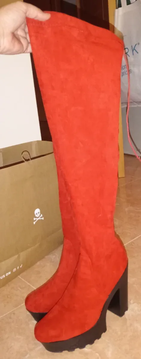 Botas pon encima de la rodilla