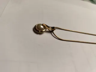 Colgante perla y cadena dorada