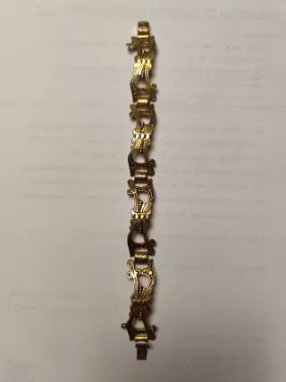Pulsera dorada eslabones ornamentados