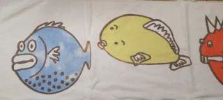 Asciugamano mare con pesci colorati