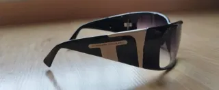 Gafas de sol Carolina Herrera negras y rosas