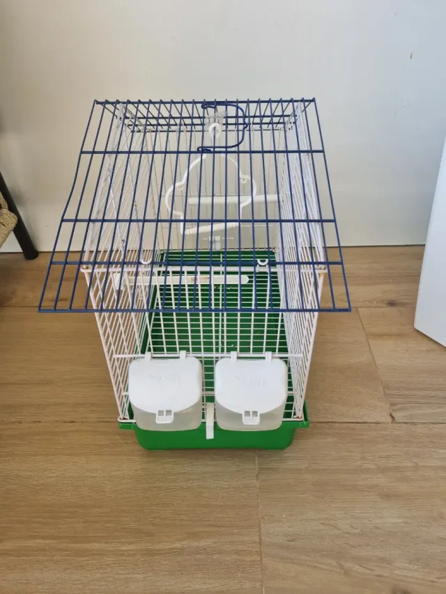 Jaula para pájaros azul y verde