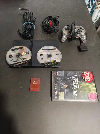 PS2 slim con joystick e accessori