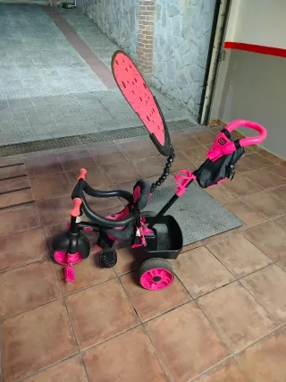Triciclo infantil rosa y negro