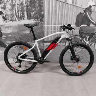 Bicicleta eléctrica MTB Rockrider E-ST 100 Blanco Rojo