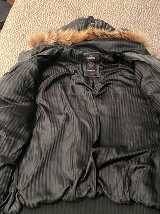 Chaqueta de cuero con capucha y pelo
