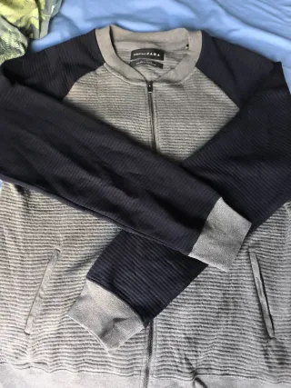 Chaqueta Zara cremallera y bolsillos punto