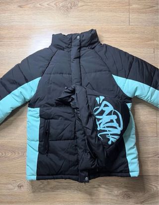 Chaqueta acolchada Syna World negra y turquesa