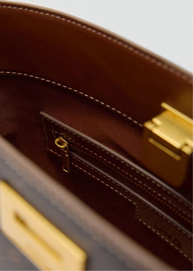 Bolso shopper con detalle metálico