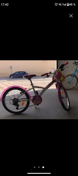 Bicicleta infantil rosa y blanca