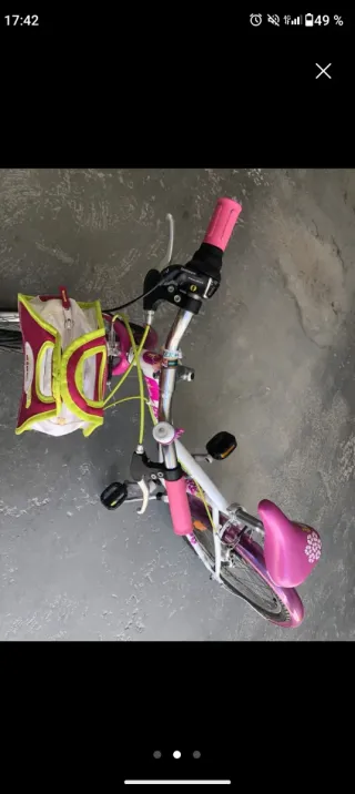 Bicicleta infantil rosa y blanca