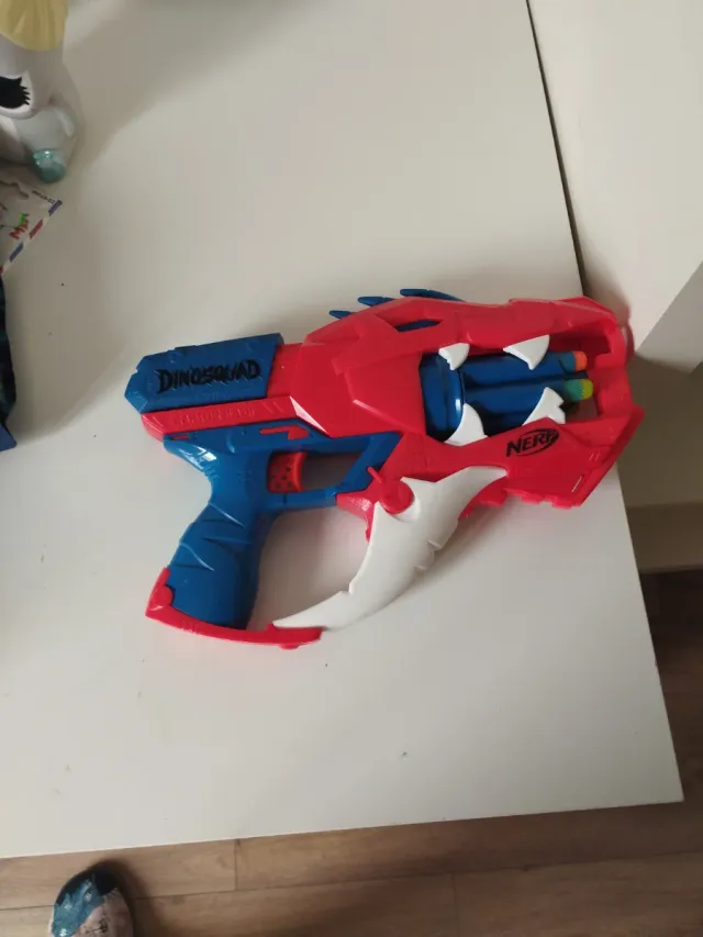 Pistola Nerf Dinosquad Niños