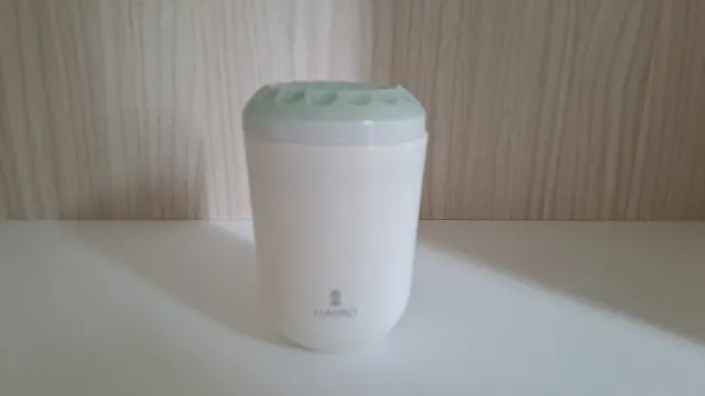 Candela Lladro' in porcellana bianca e verde