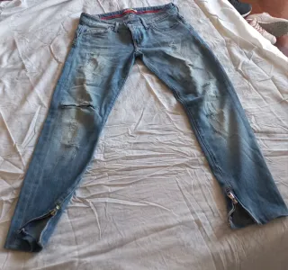 Jeans donna strappati con zip