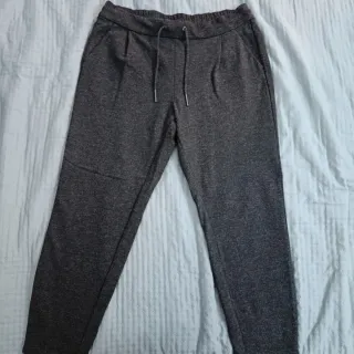 Pantalones grises tobilleros de goma Talla M