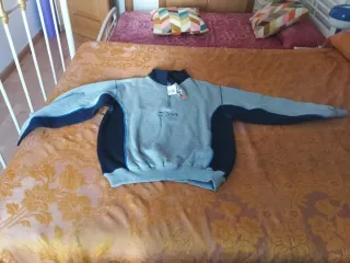 Chándal gris y azul.
Años 90-2.000
