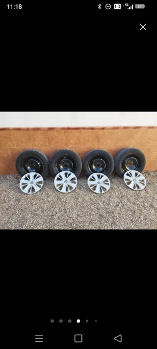 Llantas 4x100 con neumáticos y tapacubos