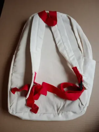 Mochila infantil beige con dino