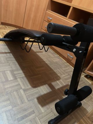 Banco de abdominales Bollinger en perfecto estado.