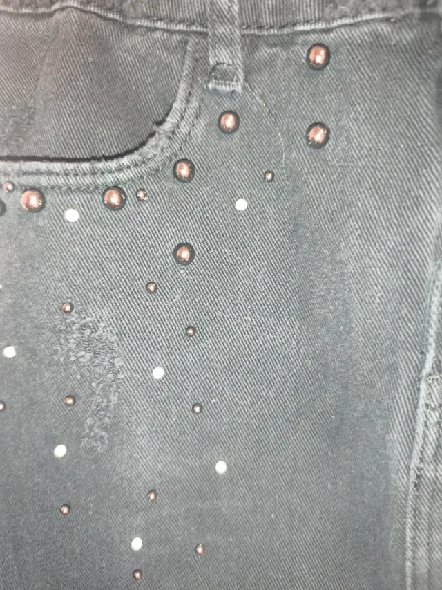 Falda vaquera mini Stradivarius tachas