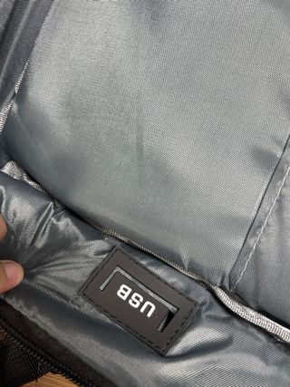 Mochila gris multi bolsillos
