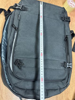 Mochila gris multi bolsillos