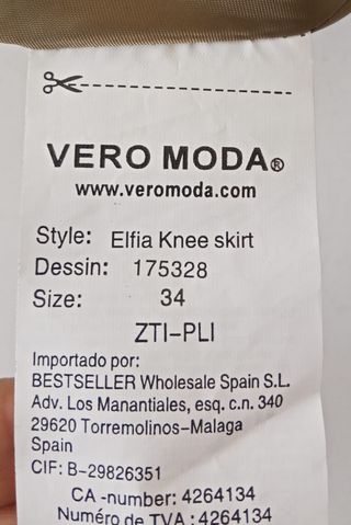 Falda midi verde con estampado fucsia
