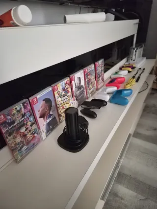 Nintendo Switch OLED White + Giochi e accessori