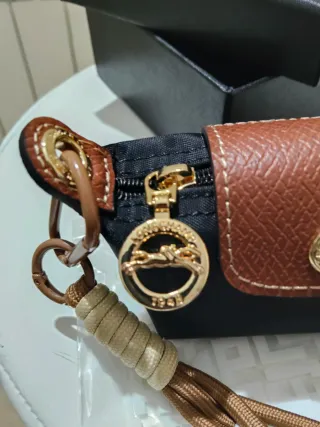 Monedero Longchamp Negro y Marrón