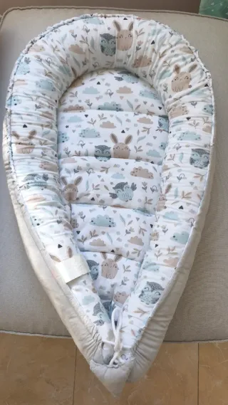 Nido para bebé con estampado de animales