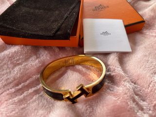 Pulsera H Hermes Negra y Dorada