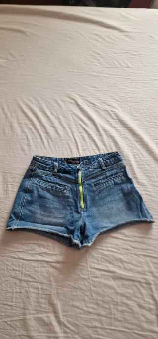 Shorts Zuiki denim con zip verde