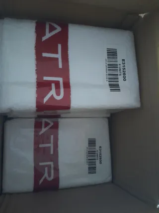 Toallas de peluquería Wella y de Loreal Profession