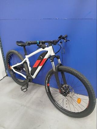 Bicicleta eléctrica MTB Rockrider E-ST 100 Blanco Rojo